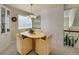 Dining room with a unique oval table, chairs, and a decorative built-in cabinet at 1011 N Pennsylvania St # H, Denver, CO 80203