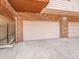 Spacious attached garage with a brick exterior and plenty of parking space at 1011 N Pennsylvania St # H, Denver, CO 80203