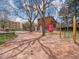 Scenic park pathway framed by trees and signage at 1011 N Pennsylvania St # H, Denver, CO 80203
