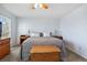 Bedroom with ceiling fan, neutral walls and carpet at 1853 S Zeno Way, Aurora, CO 80017