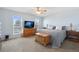 Bright, carpeted bedroom features neutral walls, two windows and a ceiling fan at 1853 S Zeno Way, Aurora, CO 80017