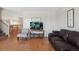 Comfortable living room with hardwood floors, neutral walls, and plenty of natural light at 1853 S Zeno Way, Aurora, CO 80017