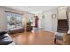 Comfortable living room with hardwood floors, neutral walls, and plenty of natural light at 1853 S Zeno Way, Aurora, CO 80017