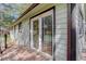 Back deck with sliding glass doors at 29762 Spruce Rd, Evergreen, CO 80439