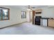 Spacious dining area featuring modern neutral carpet and bright natural light at 29762 Spruce Rd, Evergreen, CO 80439