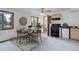 Bright dining room with a round table, four chairs, and views to the backyard at 29762 Spruce Rd, Evergreen, CO 80439