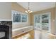 Bright dining area with a built-in bench and a large window, perfect for enjoying natural light at 29762 Spruce Rd, Evergreen, CO 80439