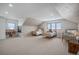 Charming bedroom featuring two twin beds, vintage wallpaper, and natural light for a cozy and inviting space at 4075 Merada Ct, Franktown, CO 80116