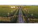 A beautiful ranch has a gated entry and a long driveway at 4075 Merada Ct, Franktown, CO 80116