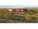 A charming two-story home has a great lawn and a mountain view at 4075 Merada Ct, Franktown, CO 80116