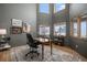 Bright and airy office space with vaulted ceilings and ample natural light offers a productive work environment at 4075 Merada Ct, Franktown, CO 80116