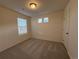Cozy bedroom with neutral carpet, recessed lights, and natural light from windows at 22023 E 38Th Pl, Aurora, CO 80019