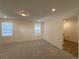 Bright bedroom features neutral carpet, recessed lighting, and large windows at 22023 E 38Th Pl, Aurora, CO 80019