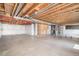 Unfinished basement with exposed beams and utilities presents a blank canvas for your future design ideas and development at 5929 Echo Hollow St, Castle Rock, CO 80104