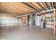 Unfinished basement with exposed beams and utilities presents a blank canvas for your future design ideas and development at 5929 Echo Hollow St, Castle Rock, CO 80104
