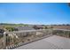 Spacious deck overlooking the neighborhood, perfect for relaxing or entertaining with scenic views of the community at 5929 Echo Hollow St, Castle Rock, CO 80104