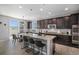 Beautiful kitchen with granite countertops, stainless steel appliances, and an island with bar seating at 5929 Echo Hollow St, Castle Rock, CO 80104
