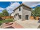 Spacious backyard with a fire pit, grassy area, and a patio for outdoor enjoyment at 4081 Odessa St, Denver, CO 80249