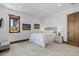 Bright bedroom with modern decor, wood trim windows, and ample natural light at 8278 Raphael Ln, Littleton, CO 80125