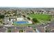 Beautiful aerial view of the community park, pool, tennis court, and green spaces at 10109 Yampa St, Commerce City, CO 80022