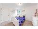 Bright bedroom with carpet, a comfy bed with decorative pillows, and ample closet space at 10109 Yampa St, Commerce City, CO 80022