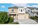 Charming two-story home with a three-car garage and beautiful, tidy landscaping at 10109 Yampa St, Commerce City, CO 80022