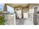 Welcoming front porch with stone accents and a white picket fence at 10109 Yampa St, Commerce City, CO 80022