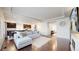 Spacious living room featuring hardwood floors and an open floor plan at 10109 Yampa St, Commerce City, CO 80022