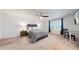Spacious main bedroom featuring a ceiling fan, shutters and carpeted flooring at 10109 Yampa St, Commerce City, CO 80022