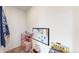Organized playroom with a miniature kitchen, a whiteboard, and ample space for activities at 10109 Yampa St, Commerce City, CO 80022
