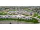 Aerial view of the community school and the parking lot, located in the neighborhood at 10109 Yampa St, Commerce City, CO 80022