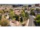 An aerial view of a multi-Gathering complex with mature trees, driveways, garages, and green space at 3001 S Ursula Cir # 101, Aurora, CO 80014