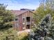 Exterior elevation of building showing private access and well maintained grounds at 3001 S Ursula Cir # 101, Aurora, CO 80014