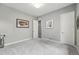 Neutral bedroom with natural light, plush carpeting, and ample closet space at 6469 Barnstead Dr, Castle Pines, CO 80108