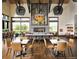 Elegant dining area with stylish furnishings, modern lighting, and a comfortable setting at 6469 Barnstead Dr, Castle Pines, CO 80108
