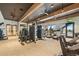 Well-equipped gym featuring modern exercise equipment and a bright, airy atmosphere at 6469 Barnstead Dr, Castle Pines, CO 80108