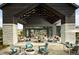 Outdoor lounge area with comfortable seating, a fire pit, and a welcoming atmosphere for residents at 6469 Barnstead Dr, Castle Pines, CO 80108