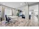 Bright office space with large desk, comfortable chair, and ample natural light at 6469 Barnstead Dr, Castle Pines, CO 80108