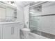 Bathroom with a new vanity, shower and tile flooring at 1285 Elder St, Denver, CO 80221