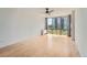 Open bedroom with large windows providing natural light and lovely community views at 3100 E Cherry Creek South Dr # 404, Denver, CO 80209