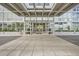 Inviting building entrance featuring a modern canopy and well-maintained landscaping at 3100 E Cherry Creek South Dr # 404, Denver, CO 80209