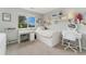 Bright bedroom with a window view, study space, and creative decor, perfect for study and relaxation at 10475 E Abilene St, Commerce City, CO 80022