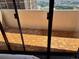 This unit boasts a private balcony with light colored flooring, accessible via sliding glass doors at 1020 15Th St # 21M, Denver, CO 80202