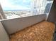 This condo features a spacious balcony with wood floors and city views at 1020 15Th St # 21M, Denver, CO 80202