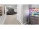Finished basement area with a home theater and beverage center at 6591 N Ceylon St, Denver, CO 80249
