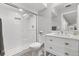 Modern bathroom features a glass-enclosed shower, sleek vanity, and stylish fixtures for a luxurious feel at 6591 N Ceylon St, Denver, CO 80249