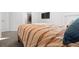 Comfortable bedroom with a decorative bedspread at 6591 N Ceylon St, Denver, CO 80249