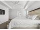 Serene main bedroom featuring a king-size bed, neutral tones, and a cozy atmosphere at 6591 N Ceylon St, Denver, CO 80249