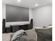 Home theater boasts surround sound and a large flat screen, perfect for an immersive viewing experience at 6591 N Ceylon St, Denver, CO 80249