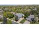 Aerial view showcases a home nestled among lush greenery in a serene neighborhood at 5302 Pinehurst Dr, Boulder, CO 80301